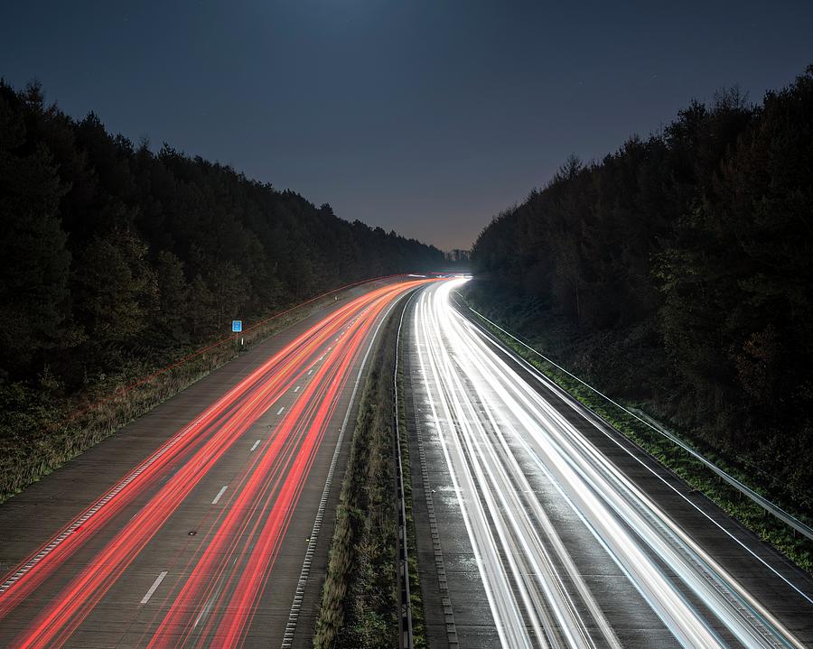 Evening Rush Hour On Motorway #2 Photograph by Robert Brook