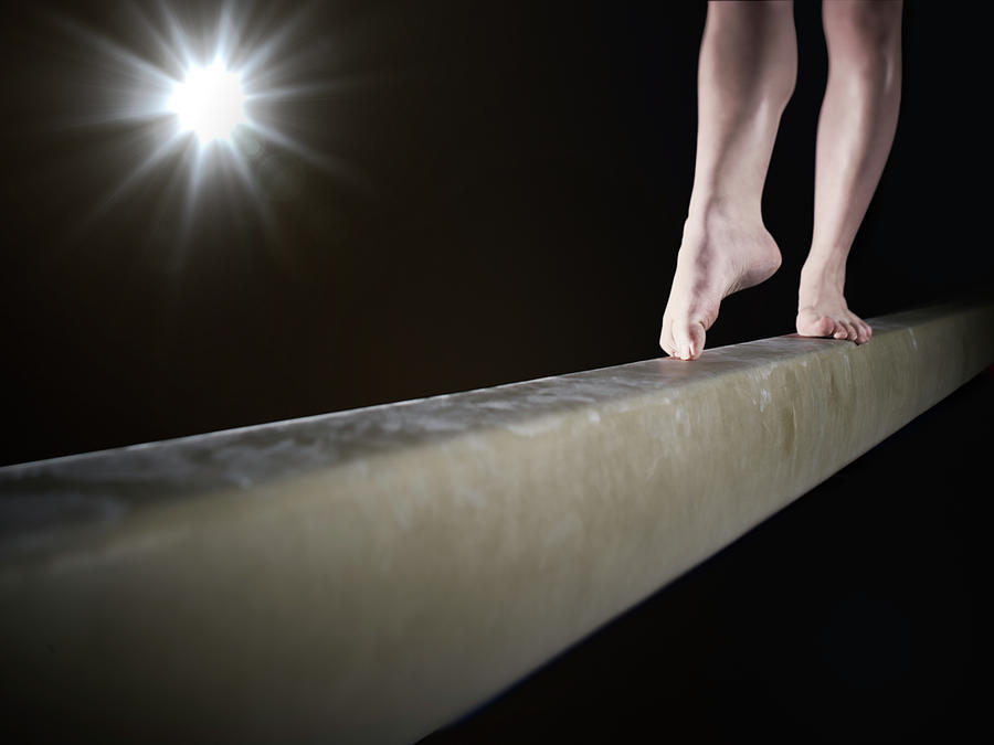 Female Gymnast On Balancing Beam #2 Photograph by Mike Harrington