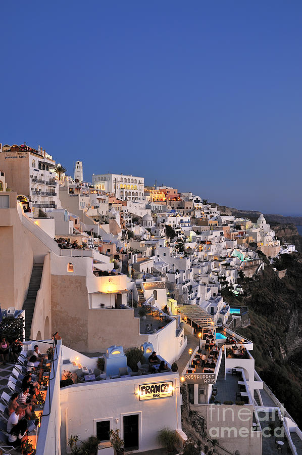 Fira town during dusk time #1 Photograph by George Atsametakis