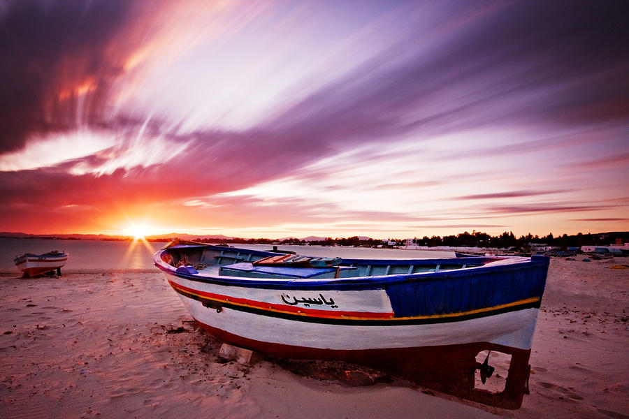 Sunset Photograph - Fishing Boat at Sunset / Tunisia by Barry O Carroll