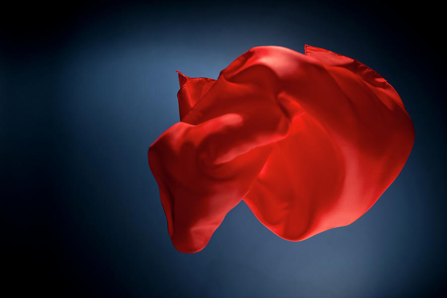 Floating Red Silk On A Dark Blue #2 Photograph by Gm Stock Films