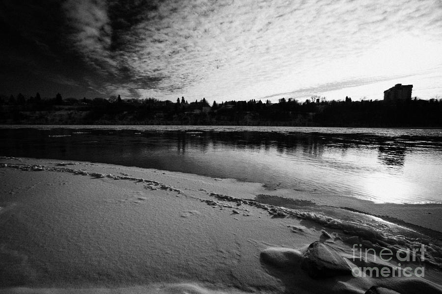 frozen river bank of the south saskatchewan river in ...
