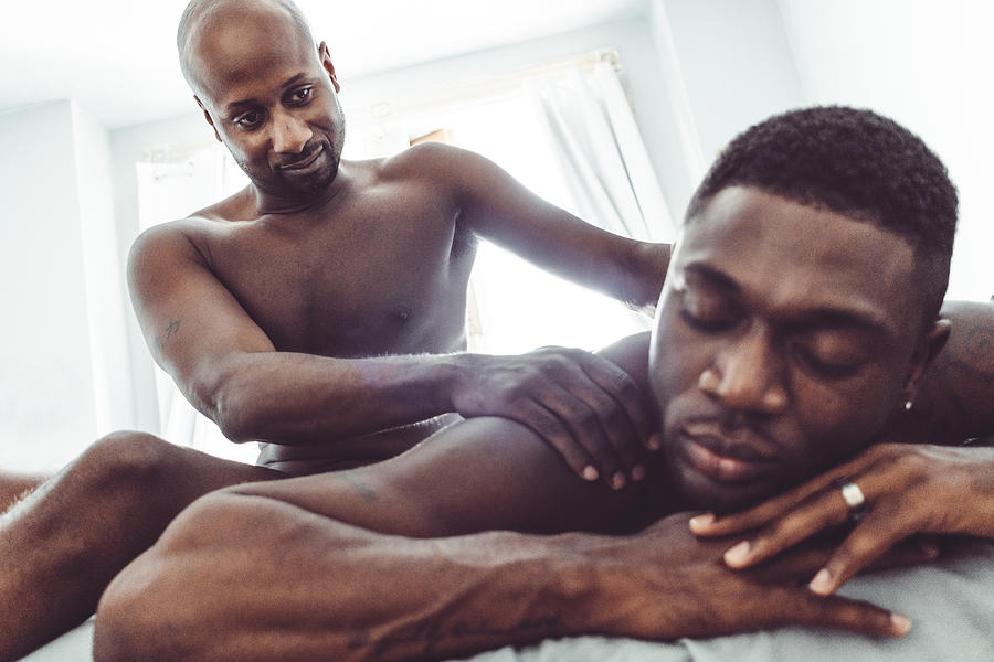 Gay Couple Share The Massage In The Bed #2 Photograph by Franckreporter