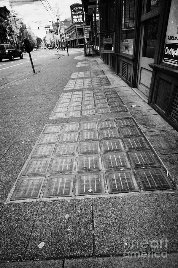 City Photograph - glass blocks in the sidewalk to light basement of the sam kee building in Vancouver BC Canada #2 by Joe Fox