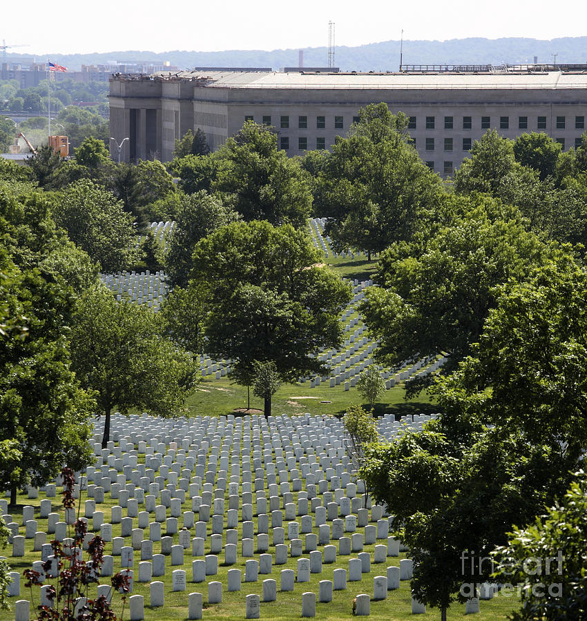 Graves of Arlington National Cemetery Roll Down to the Pentagon Photograph by William Kuta