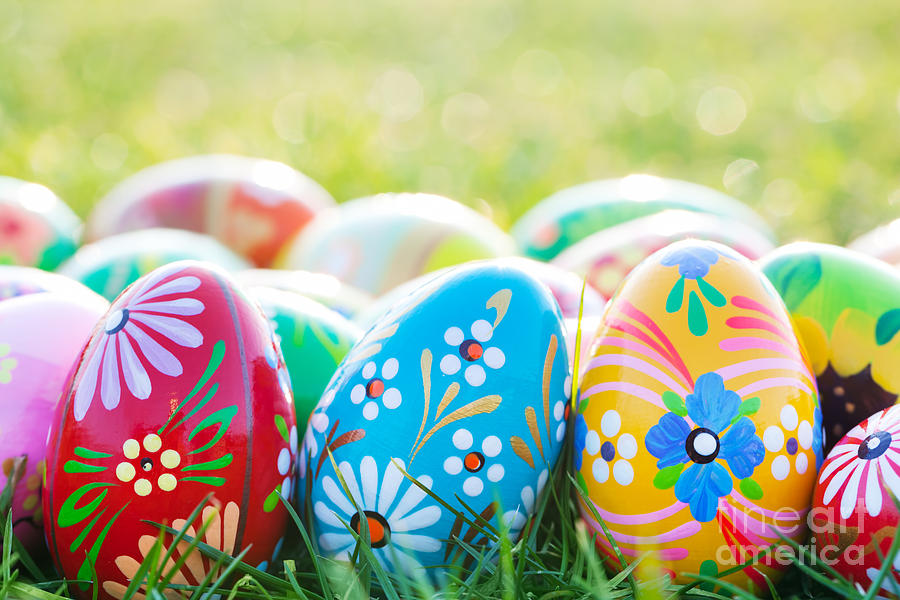 Easter Photograph - Hand-painted Easter eggs on grass #2 by Michal Bednarek