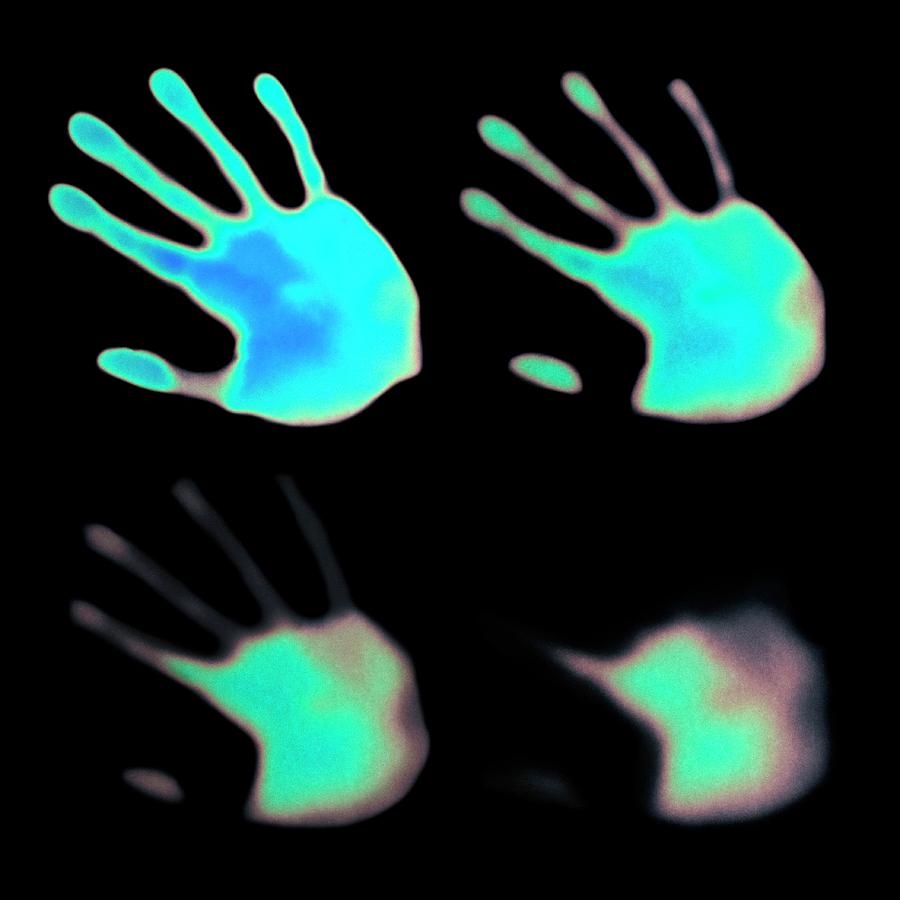 Hand Prints On Thermochromic Paper #2 Photograph by Science Photo Library