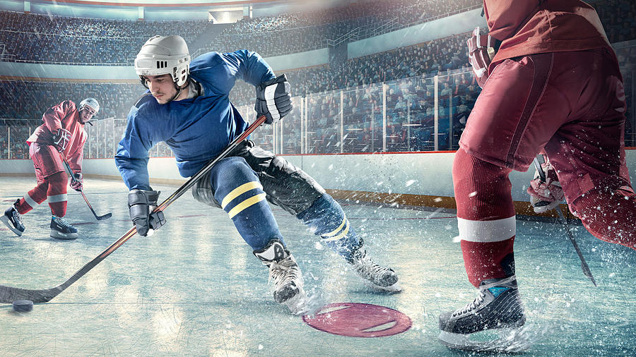 Ice hockey players in action #2 Photograph by Dmytro Aksonov