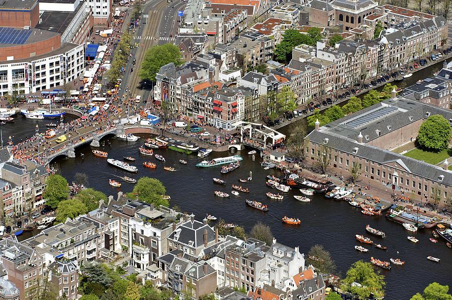 Transportation Photograph - Koninginnedag Or Queens Day, Amsterdam #2 by Bram van de Biezen