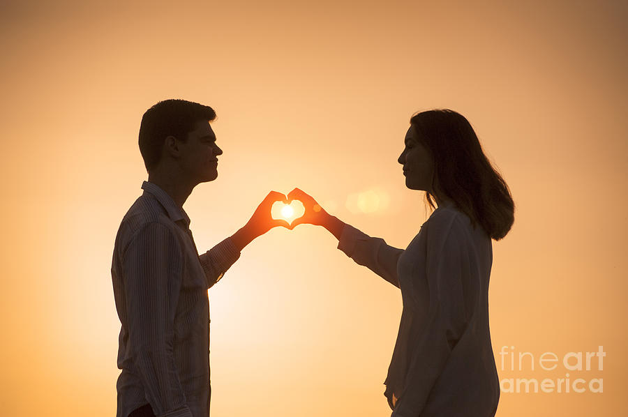 Sunset Photograph - Lovers Making A Heart Shape At Sunset #2 by Lee Avison