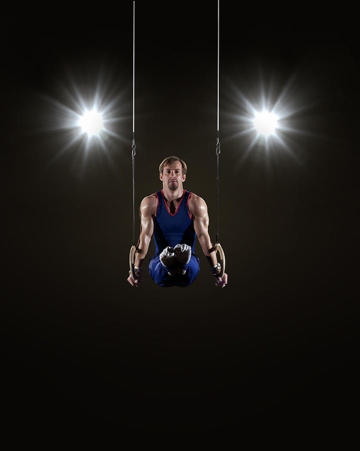Male Gymnast On Rings #2 Photograph by Mike Harrington