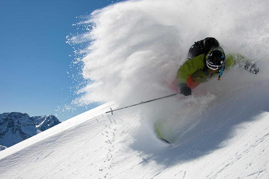 Male Skier Skiing Powder On A Sunny Day Photograph by Gabe Rogel - Fine ...