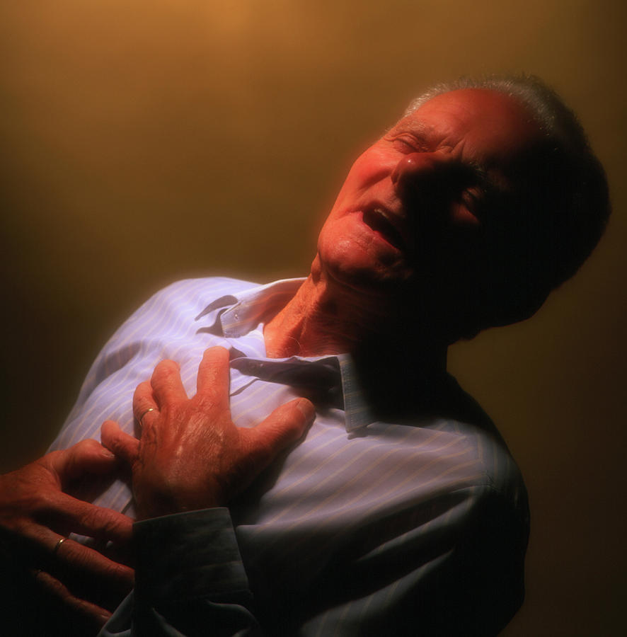 Man Holds His Chest Due To Angina Or Heart Attack #2 Photograph by Saturn Stills/science Photo Library