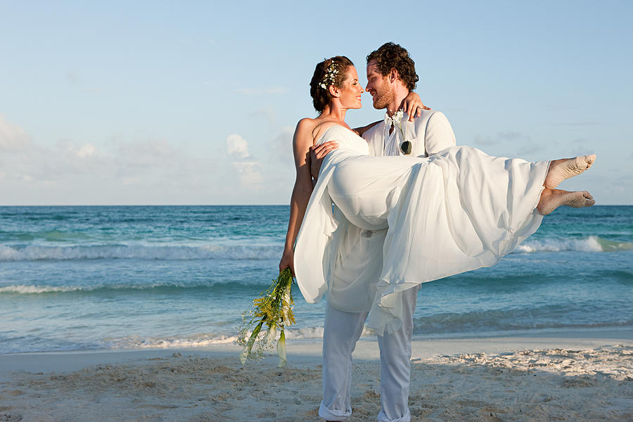 Married couple on beach #2 Photograph by Image Source