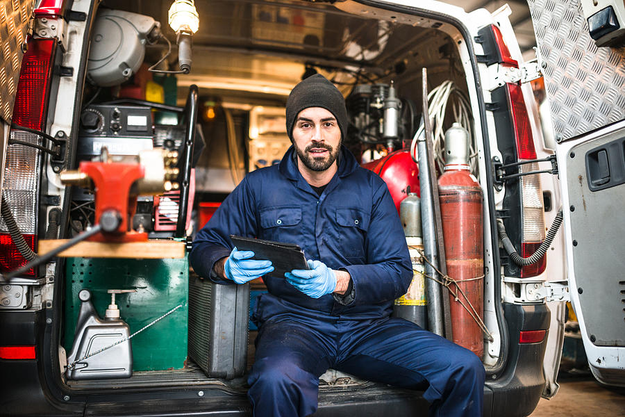 Mechanic Technician On A Garage #2 Photograph by Franckreporter