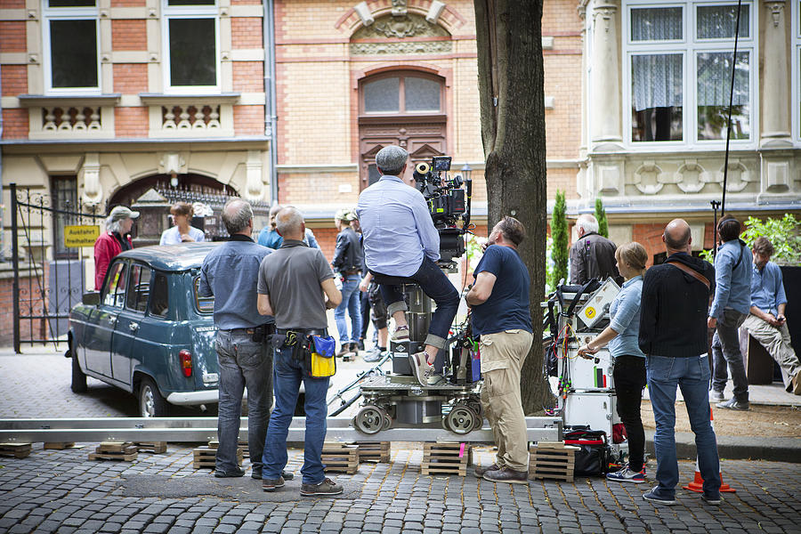 Movie set on a street in Wiesbaden #2 Photograph by Ollo