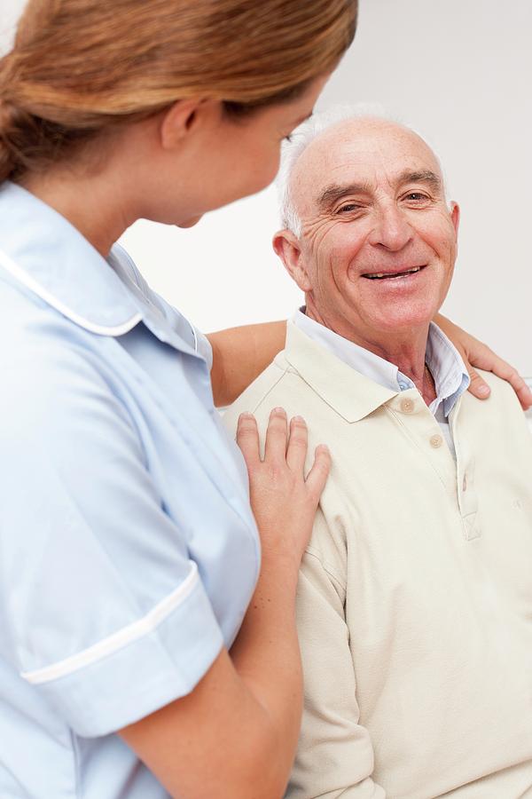 Nurse With Senior Male Patient #2 by Science Photo Library