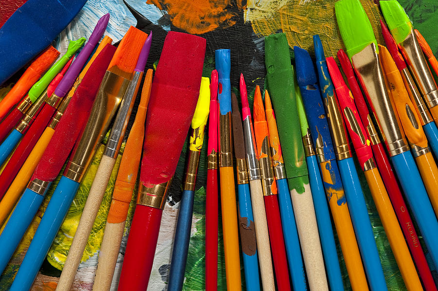 Paintbrushes lined up on palette #2 Photograph by Jim Corwin