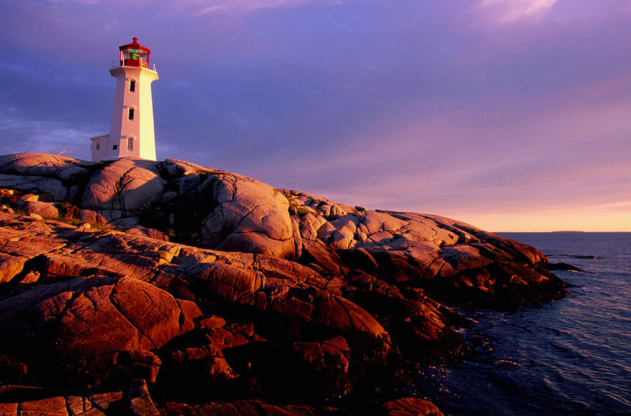 Peggys Cove Lighthouse At Sunset Photograph by Greg Johnston