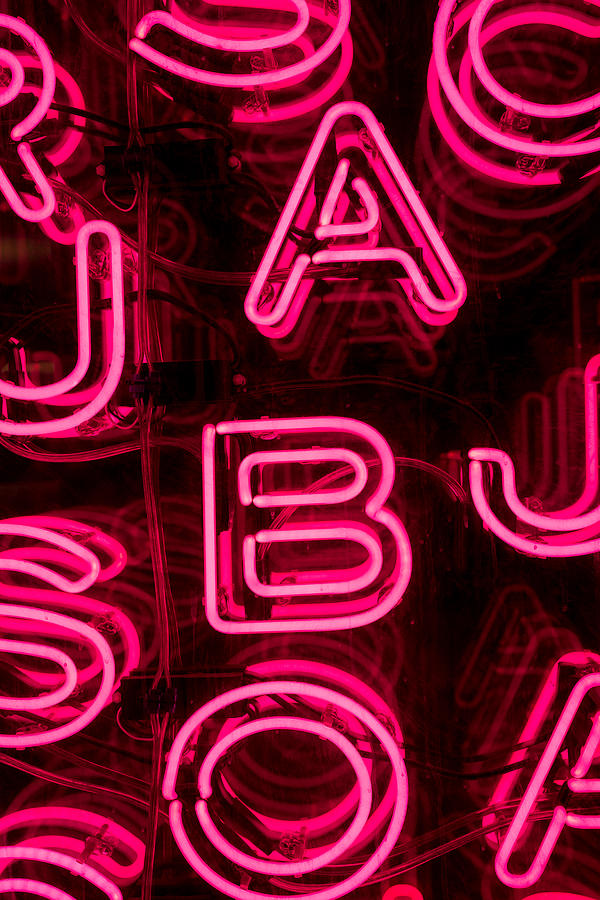 Pink Neon Letters Photograph by Chay Bewley