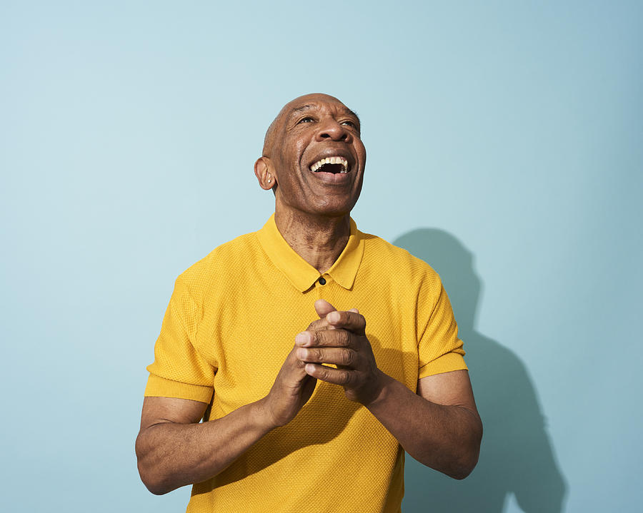 Portrait of a mature man dancing, smiling and having fun #2 Photograph by Flashpop