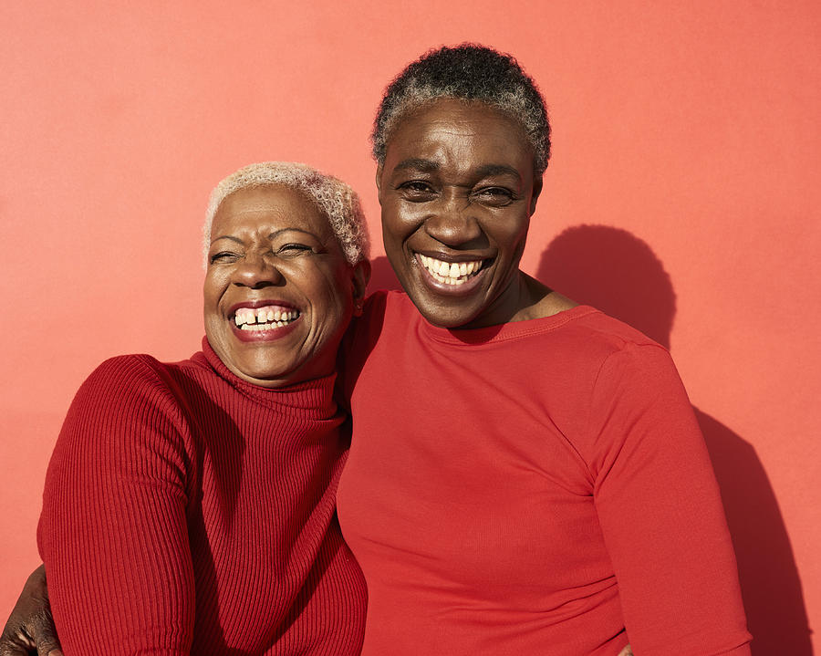 Portrait of two women smiling #2 Photograph by Flashpop