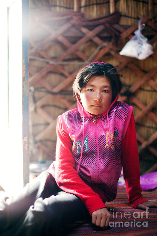 Portrait of young kyrgyz girl inside a yurt China #2 Photograph by Matteo Colombo