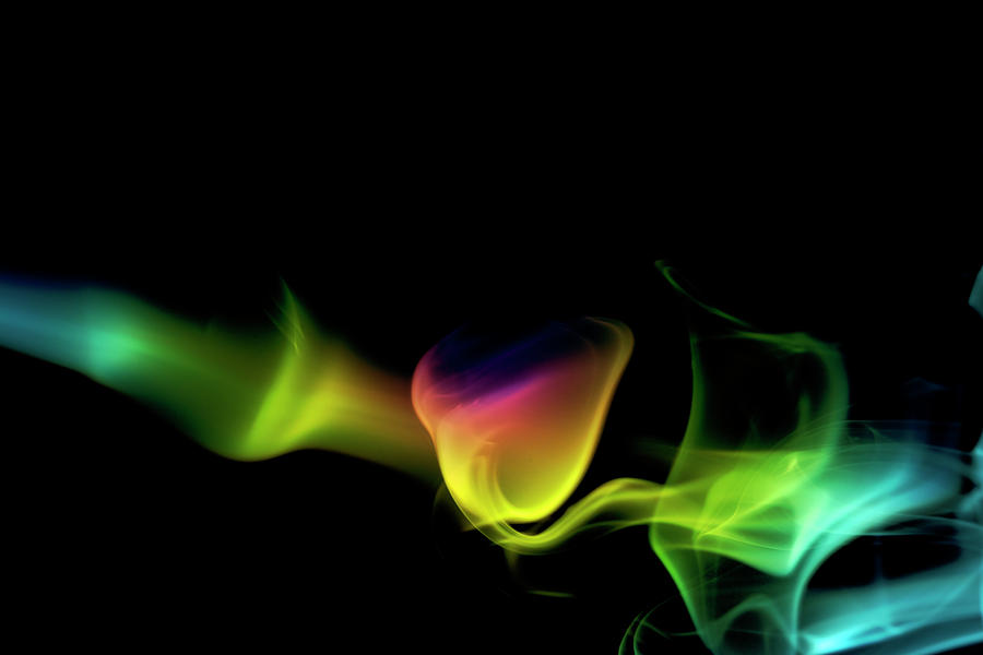 Rainbow Smoke On A Black Background #2 Photograph by Gm Stock Films