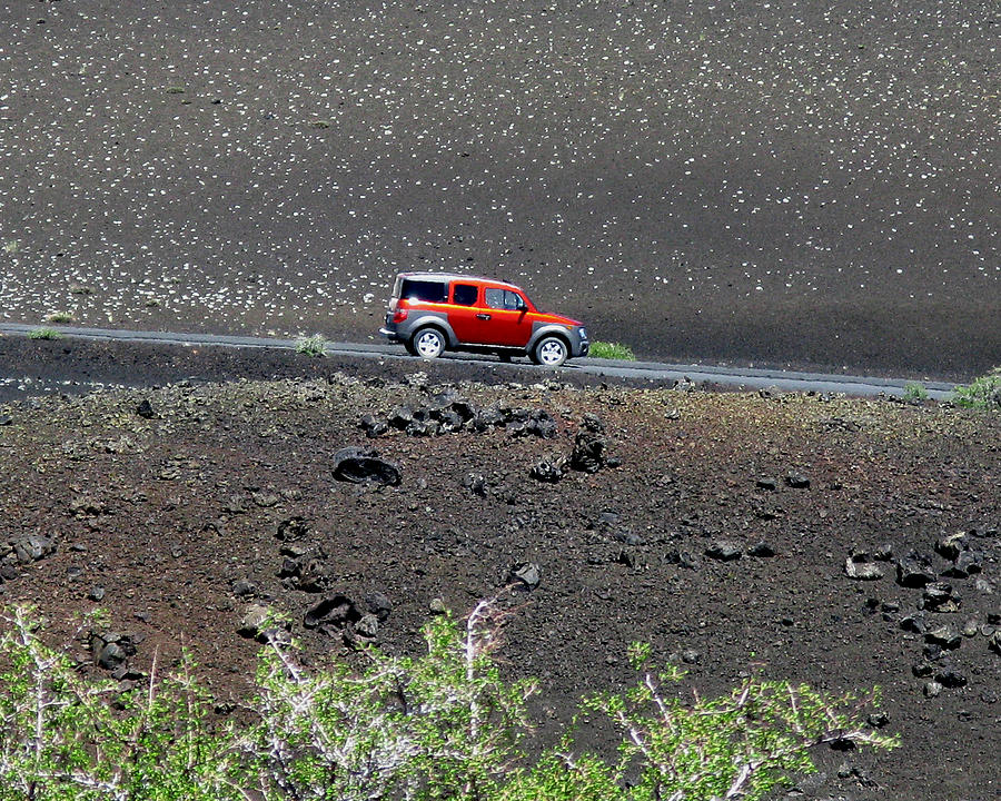 Craters Of The Moon National Monument Photograph - Red Car in Craters of the Moon #2 by Patricia Januszkiewicz