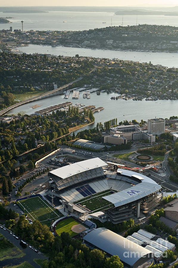 Seattle skyline with aerial view of the newly renovated Husky St #2 Photograph by Jim Corwin