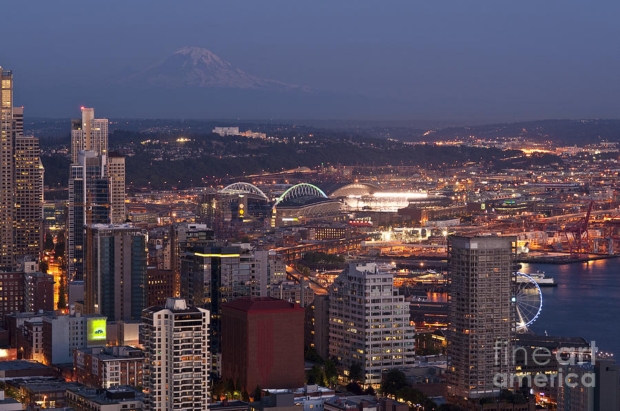 Seattle skyline with Mount Rainier and downtown city lights #2 Photograph by Jim Corwin
