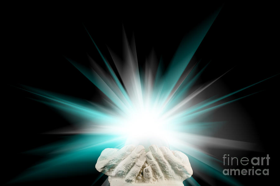 Spiritual light in cupped hands on a black background #2 Photograph by Simon Bratt