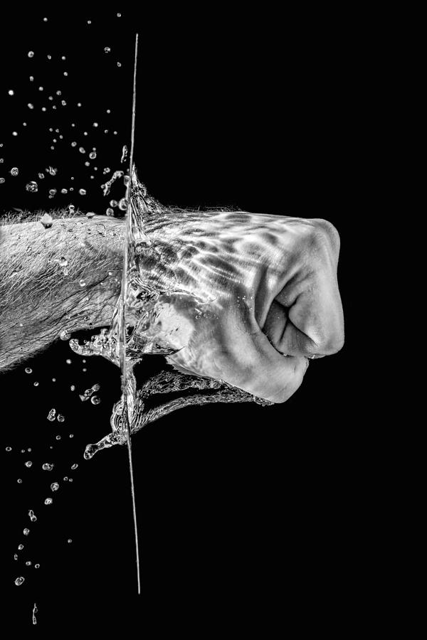 Splashing Fist #2 Photograph by Peter Lakomy