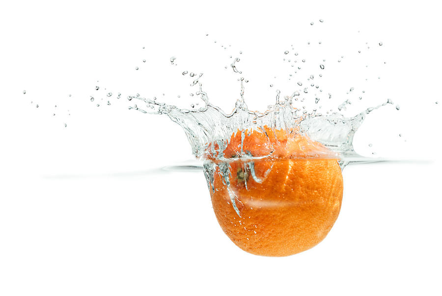 Splashing Orange #2 Photograph by Peter Lakomy