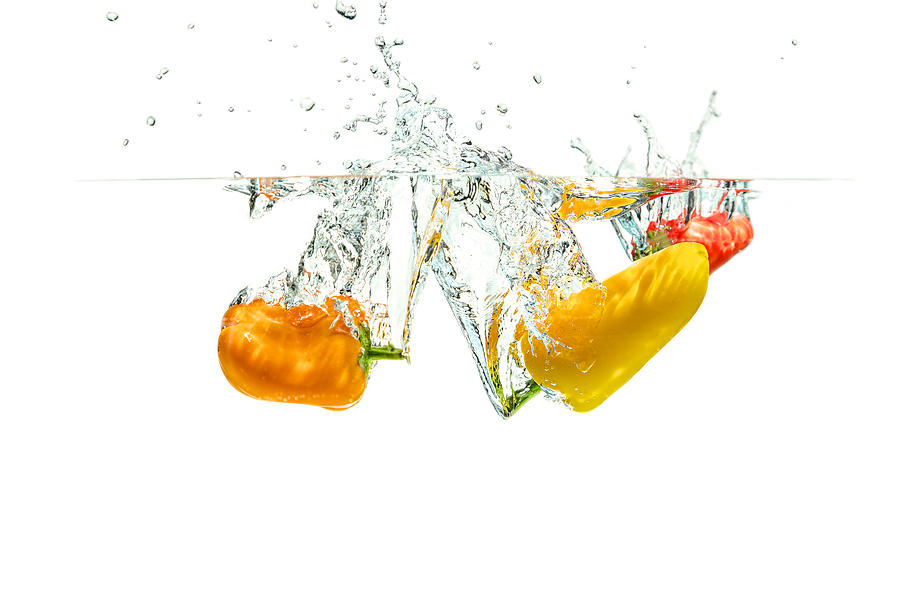 Splashing Paprika #2 Photograph by Peter Lakomy