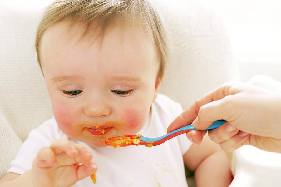 spoon-feeding-photograph-by-ruth-jenkinson-science-photo-library