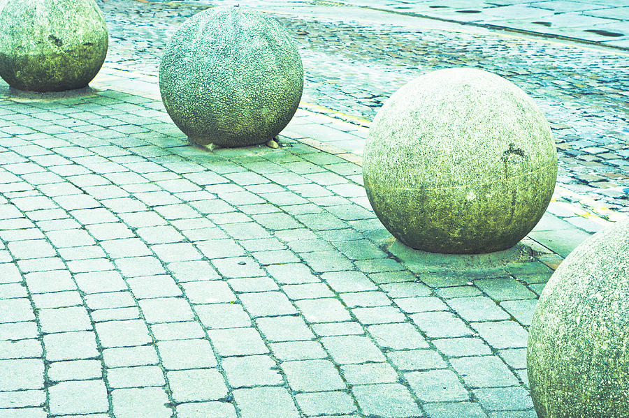 Architecture Photograph - Stone balls #2 by Tom Gowanlock
