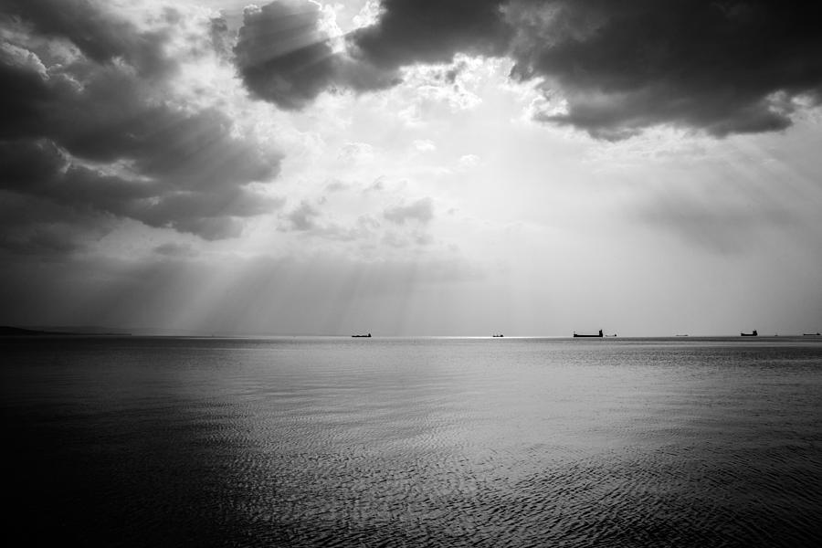 Sunrays scattered by clouds over Trieste Bay #2 Photograph by Ian Middleton