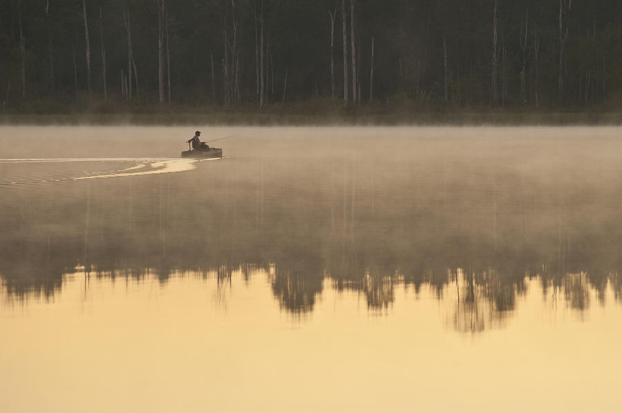 Sunrise in fog Lake Cassidy with fisherman in small fishing boat #3 Photograph by Jim Corwin