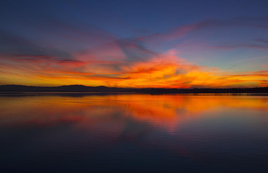 Sunset over the lake Photograph by Stockr - Fine Art America