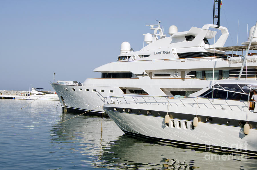 Superyachts in the port of Puerto Banus #1 Photograph by Perry Van Munster