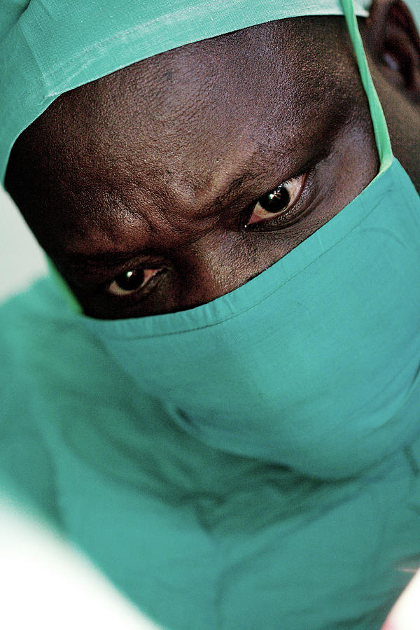 Hat Photograph - Surgeon In An Operating Theatre #2 by Mauro Fermariello/science Photo Library