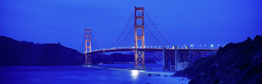 Suspension Bridge Lit Up At Night #2 Photograph by Panoramic Images