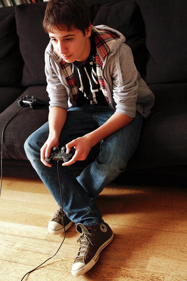 Computer Photograph - Teenager Playing A Video Game #2 by Mauro Fermariello/science Photo Library