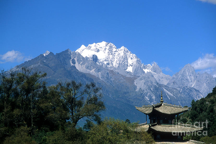 Pagoda and Jade Dragon Snow Mountain China Photograph by James Brunker