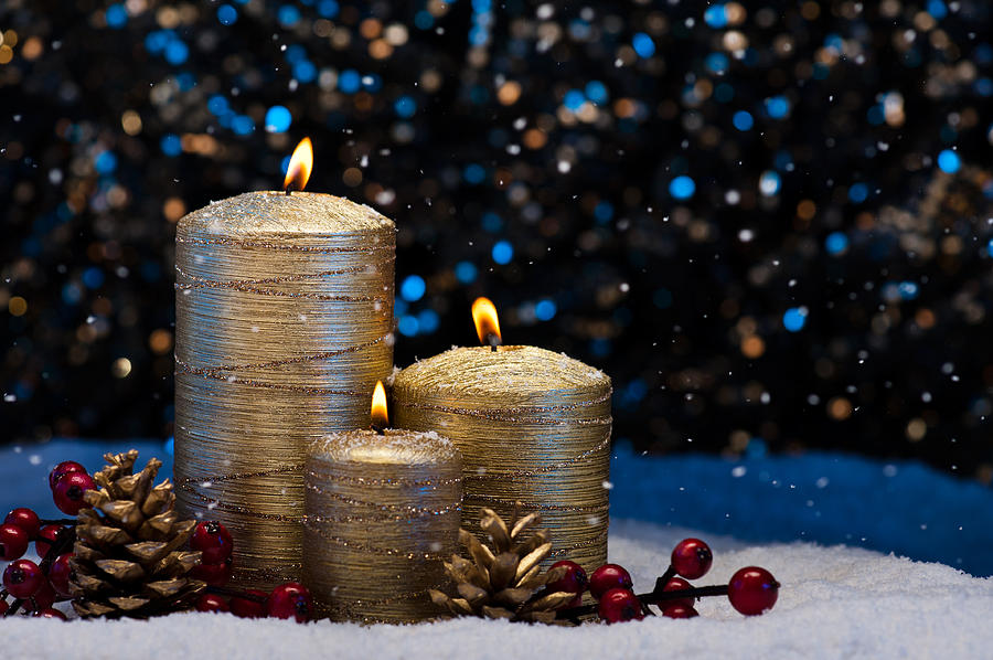 Three Gold Candles in snow  #2 Photograph by U Schade