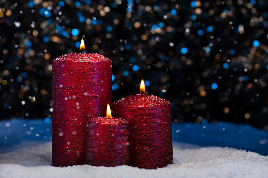 Three Red Candles in snow  #2 Photograph by U Schade