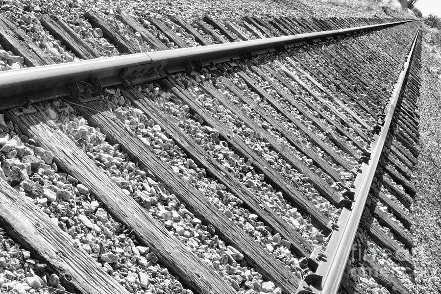 Train Tracks Triangular In Black And White Photograph
