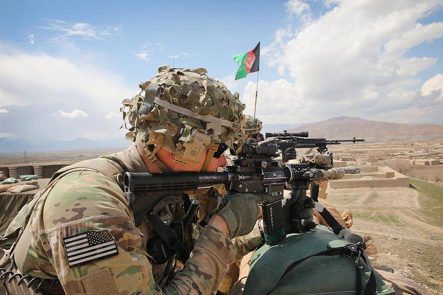 US Troops Patrol Village In Afghanistans Logar Province Photograph by Scott Olson US Troops Patrol Village In Afghanistans Logar Province Photograph by Scott Olson