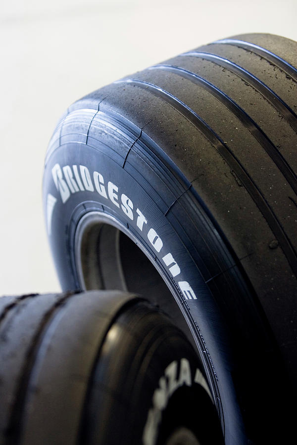 Used Formula One Car Tyres #2 Photograph by Gustoimages/science Photo Library